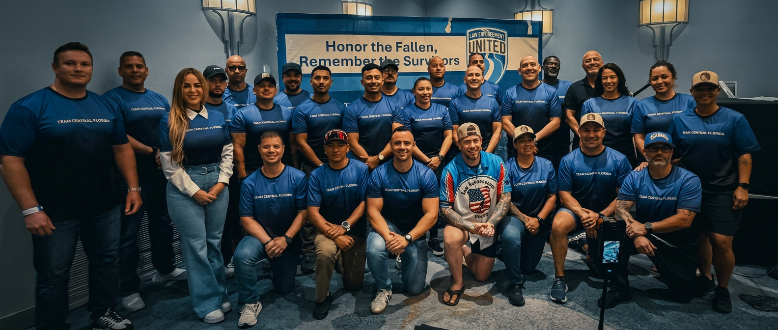 Team Central Florida riders gathered beneath the Law Enforcement United banner